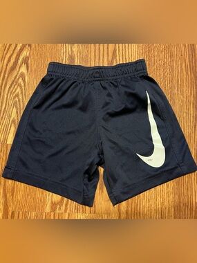 Nike Kids Black Shorts with White Swoosh size 4/xs